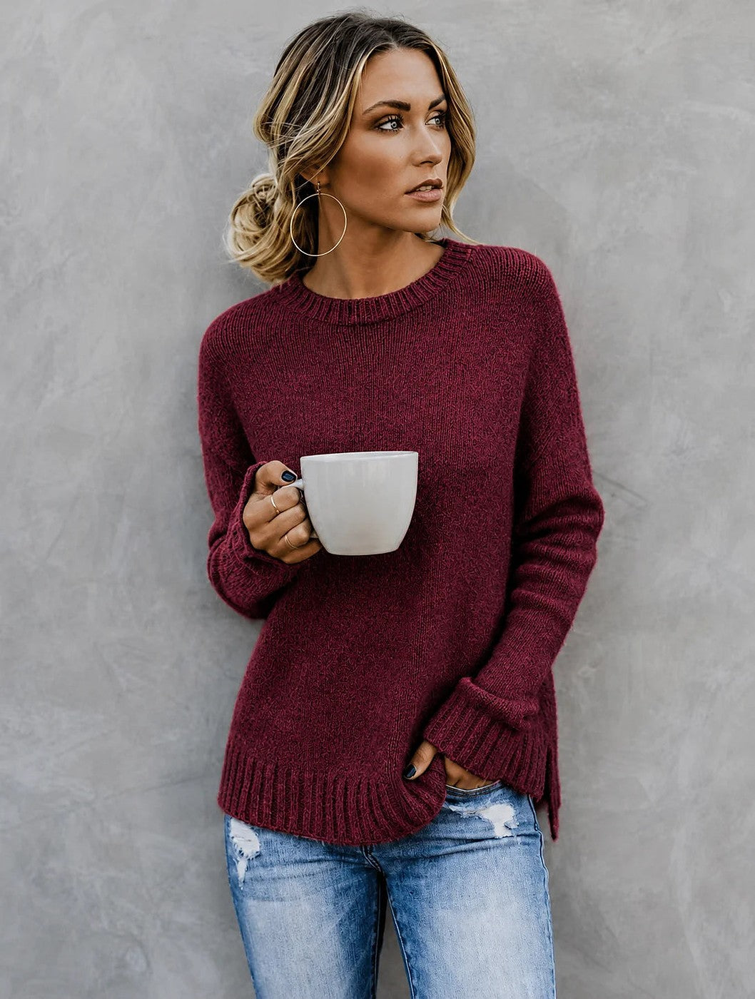 Women's marled knit crew neck sweater with side slits in wine