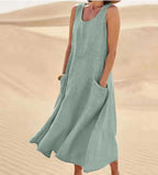 Cotton women's dress featuring a relaxed fit, stylish pockets, and a comfortable design, perfect for casual outings or everyday wear. 7