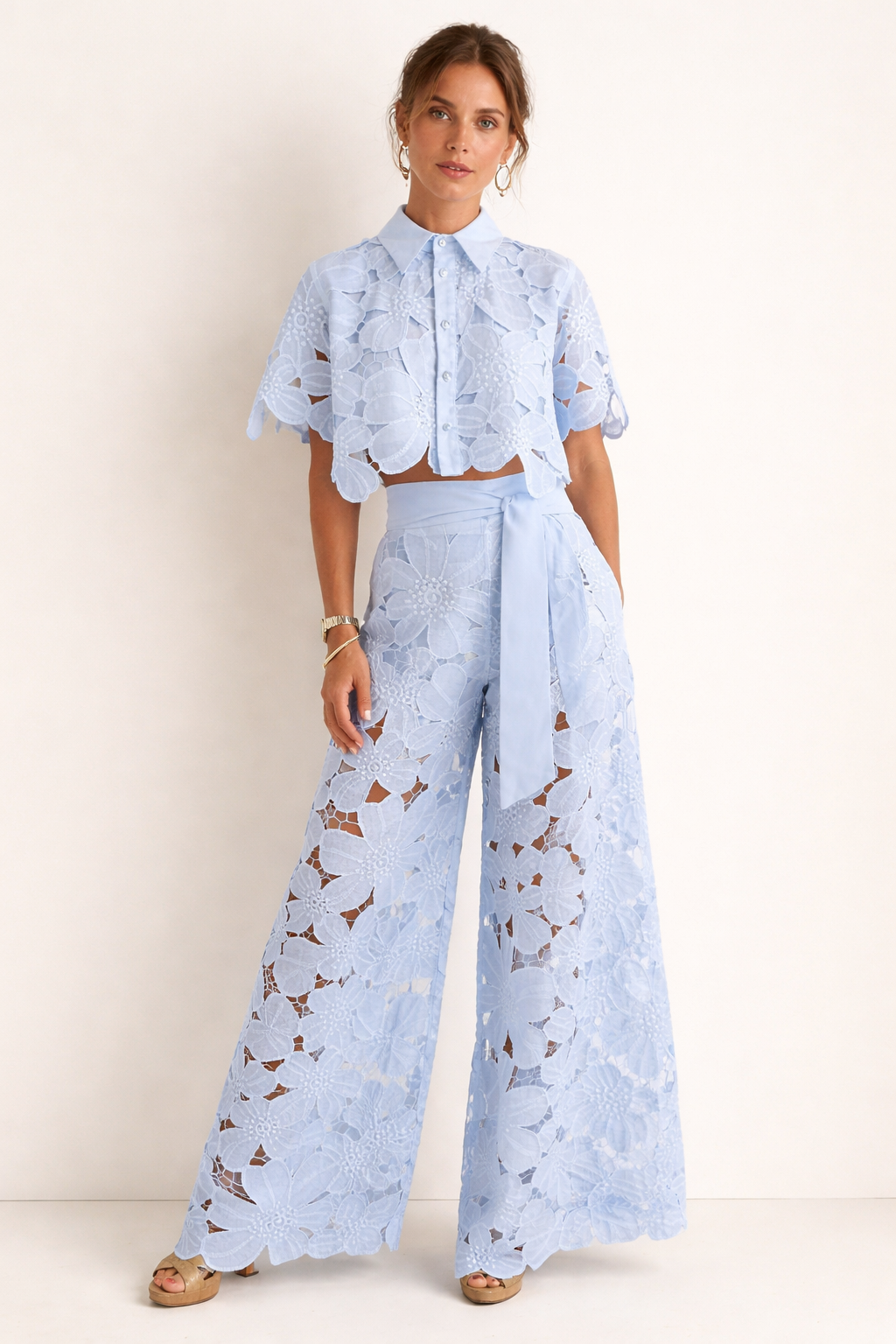Floral lace women's set featuring a short sleeve blouse and wide leg pants, perfect for stylish summer outfits. 0