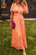 Floral print long summer dress featuring a defined waist design, perfect for warm weather outings and casual events. 0