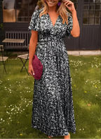 Floral print long summer dress featuring a defined waist design, perfect for warm weather outings and casual events. 9