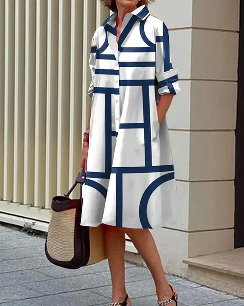 Geometric print dress with pockets made from a comfortable cotton-polyester blend, perfect for casual wear. 0