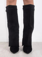 Knee high boots with a stylish flared top and comfortable block heel, perfect for fashionable fall and winter outfits. 4