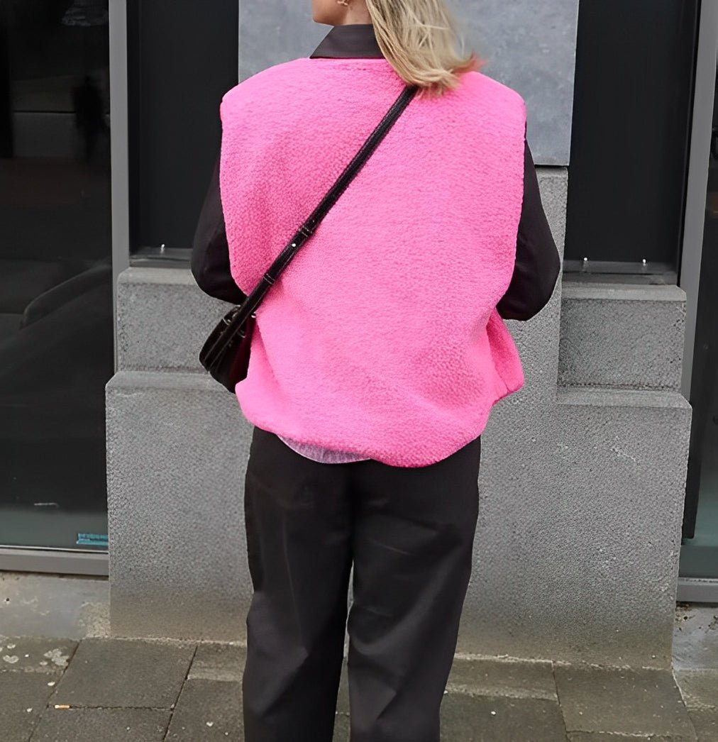 Lambswool vest with button front in slim fit, showcasing a stylish design and cozy texture, perfect for layering in cooler weather. 6