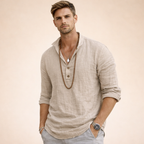 Linen shirt with high collar and long sleeves for men and women, ideal for casual or formal wear, showcasing a stylish and breathable design. 1