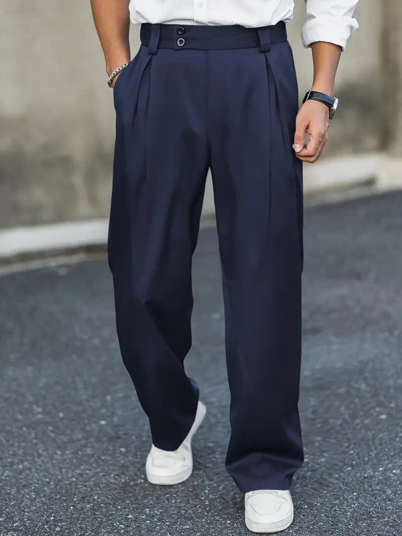 Loose-fitting wide leg trousers featuring stylish pleats and a double waistband, perfect for a comfortable yet fashionable look. 0