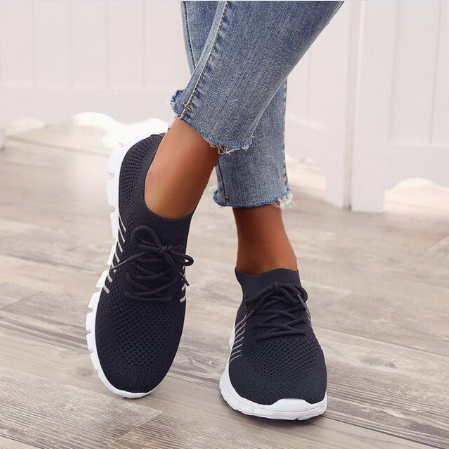 Orthopedic sneakers featuring a breathable mesh upper and advanced shock absorption technology for ultimate comfort and support during walking and activities. 1