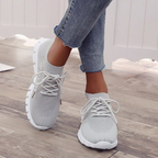 Orthopedic sneakers featuring a breathable mesh upper and advanced shock absorption technology for ultimate comfort and support during walking and activities. 2