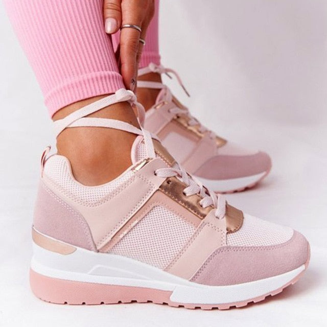 Orthopedic women's sneaker featuring arch support and cushioning for enhanced comfort and stability during daily activities. 2