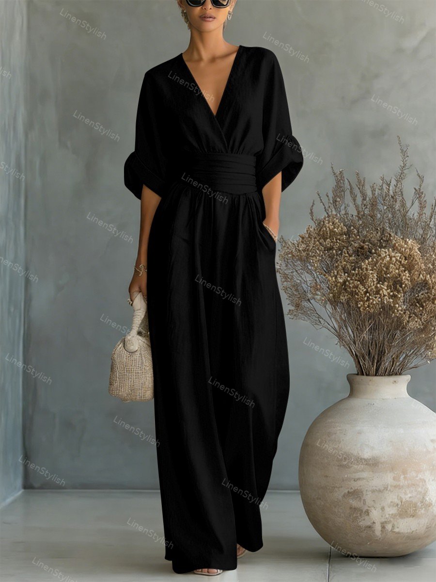 V-Neck jumpsuit for women featuring a tailored fit and luxurious silk-touch fabric, perfect for elegant occasions and stylish outings. 8