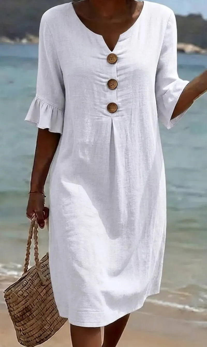 White summer dress featuring ruffled sleeves, made from a soft cotton-linen blend, perfect for warm weather outings and casual occasions. 0