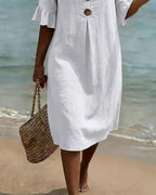 White summer dress featuring ruffled sleeves, made from a soft cotton-linen blend, perfect for warm weather outings and casual occasions. 3