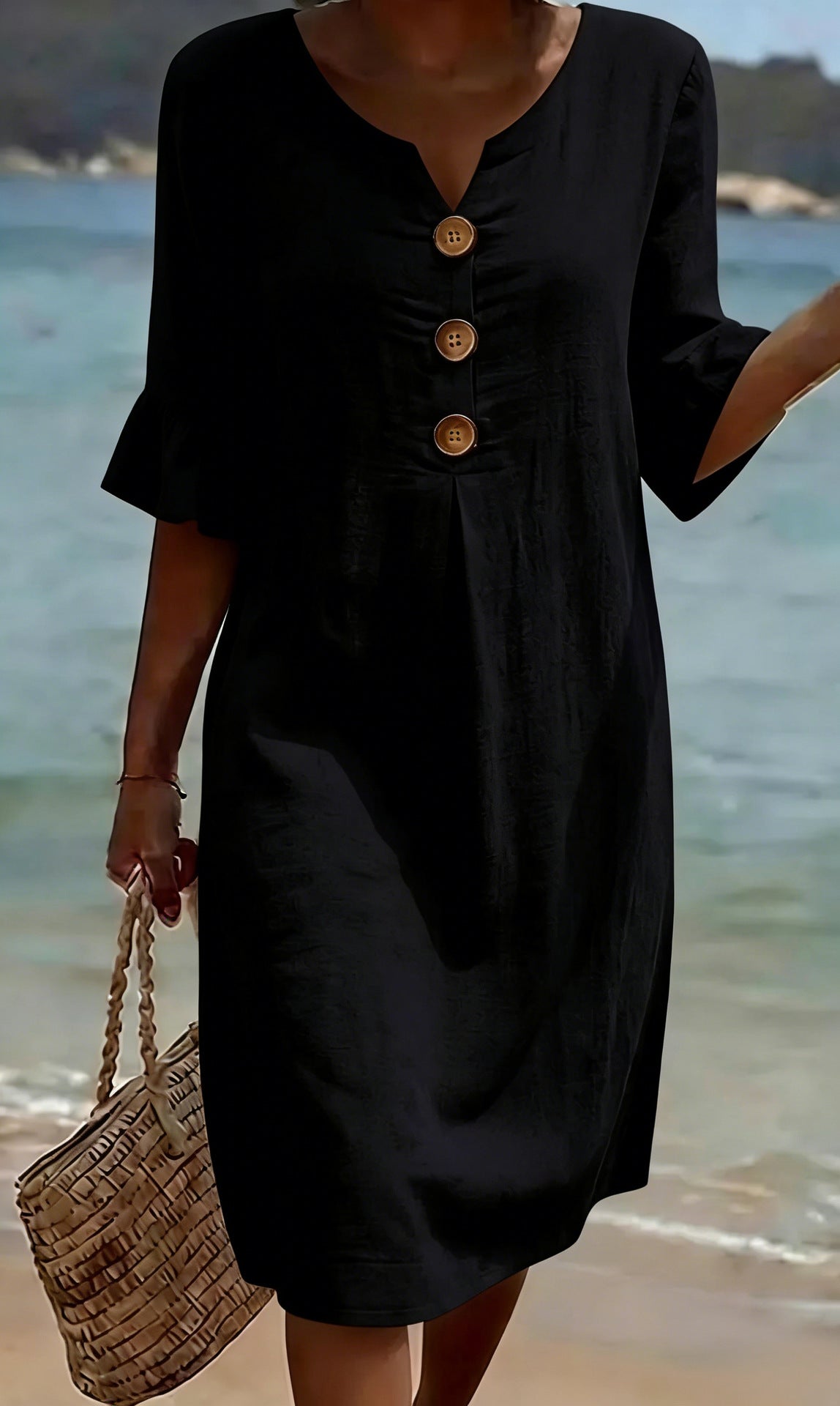 White summer dress featuring ruffled sleeves, made from a soft cotton-linen blend, perfect for warm weather outings and casual occasions. 4