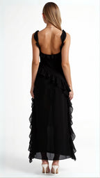 Elegant women's evening dress featuring ruffled details, perfect for formal occasions, showcasing a flowing maxi silhouette in a sophisticated design. 2