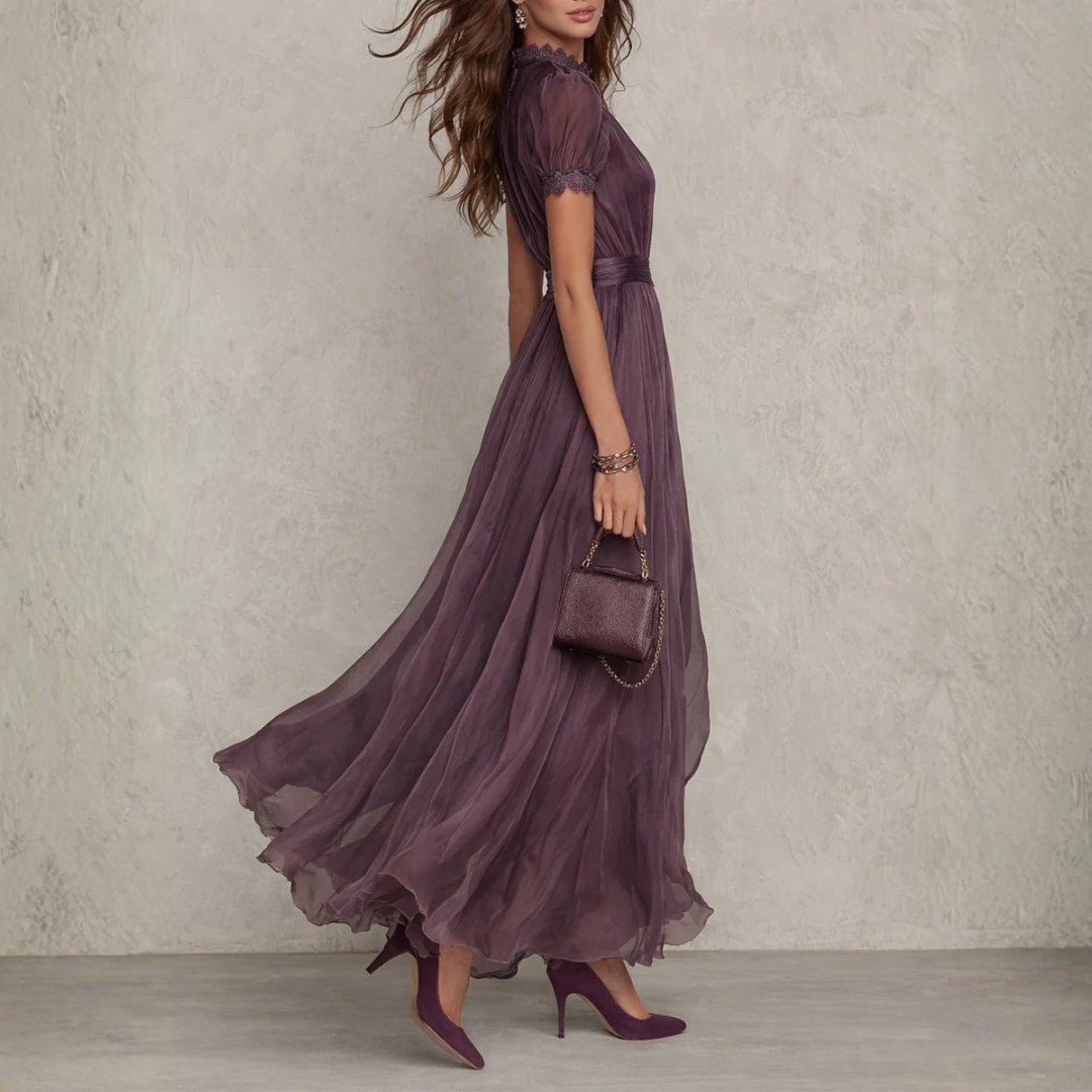 Elegant women's maxi dress featuring delicate lace trim, perfect for formal occasions and special events. 2