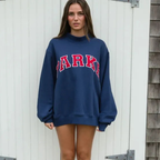 Women's oversized sweatshirt featuring soft chenille lettering, perfect for casual everyday wear and stylish comfort. 6