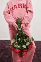 Women's oversized sweatshirt featuring soft chenille lettering, perfect for casual everyday wear and stylish comfort. 7