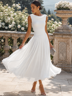 Women's sleeveless pleated midi dress in plus size, perfect for formal cocktails, featuring a flattering silhouette and elegant design. 4