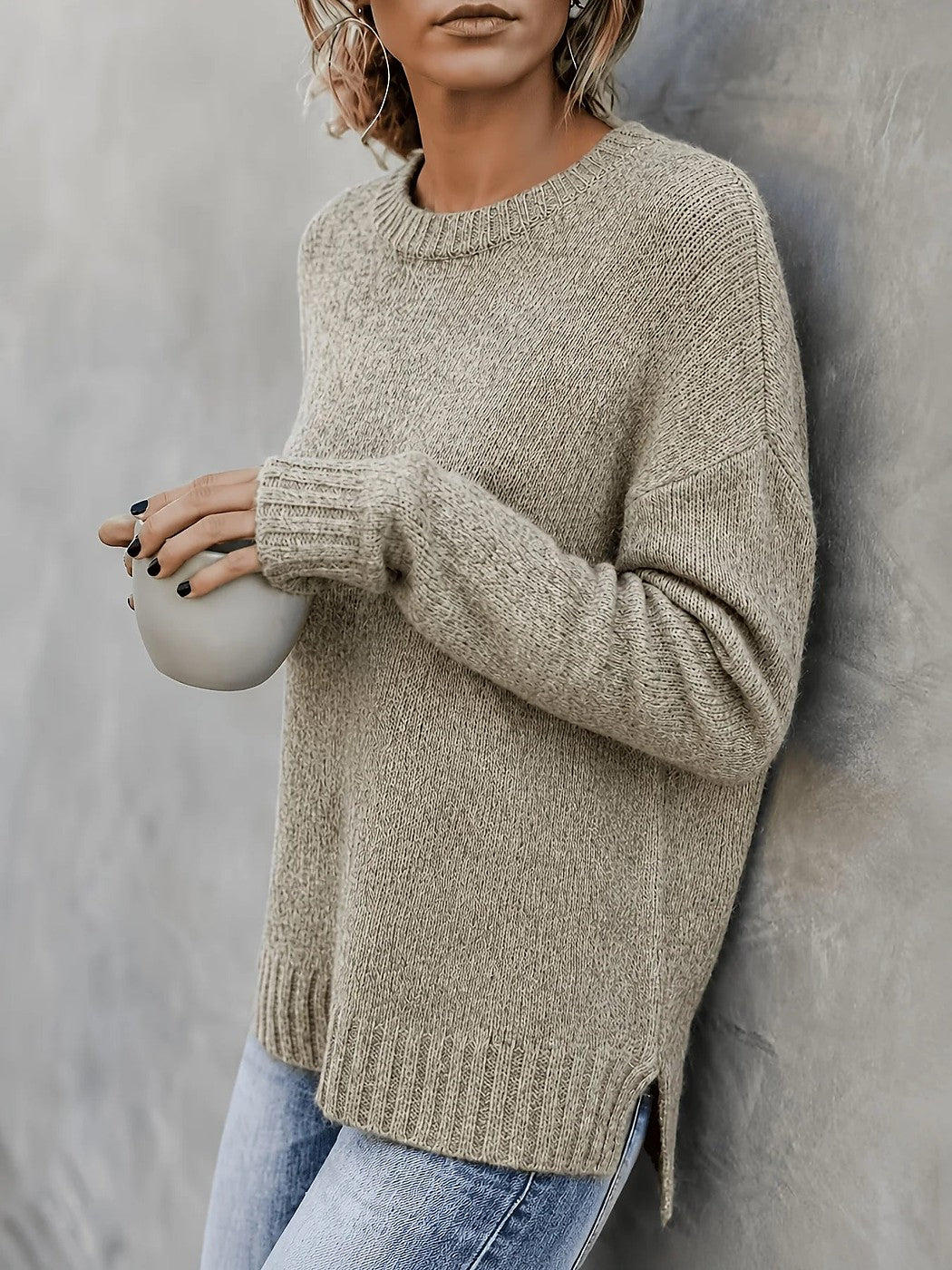 Women's marled knit crew neck sweater with side slits